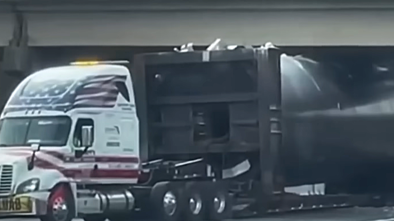 An oversize load ignored the clearance and jammed the road