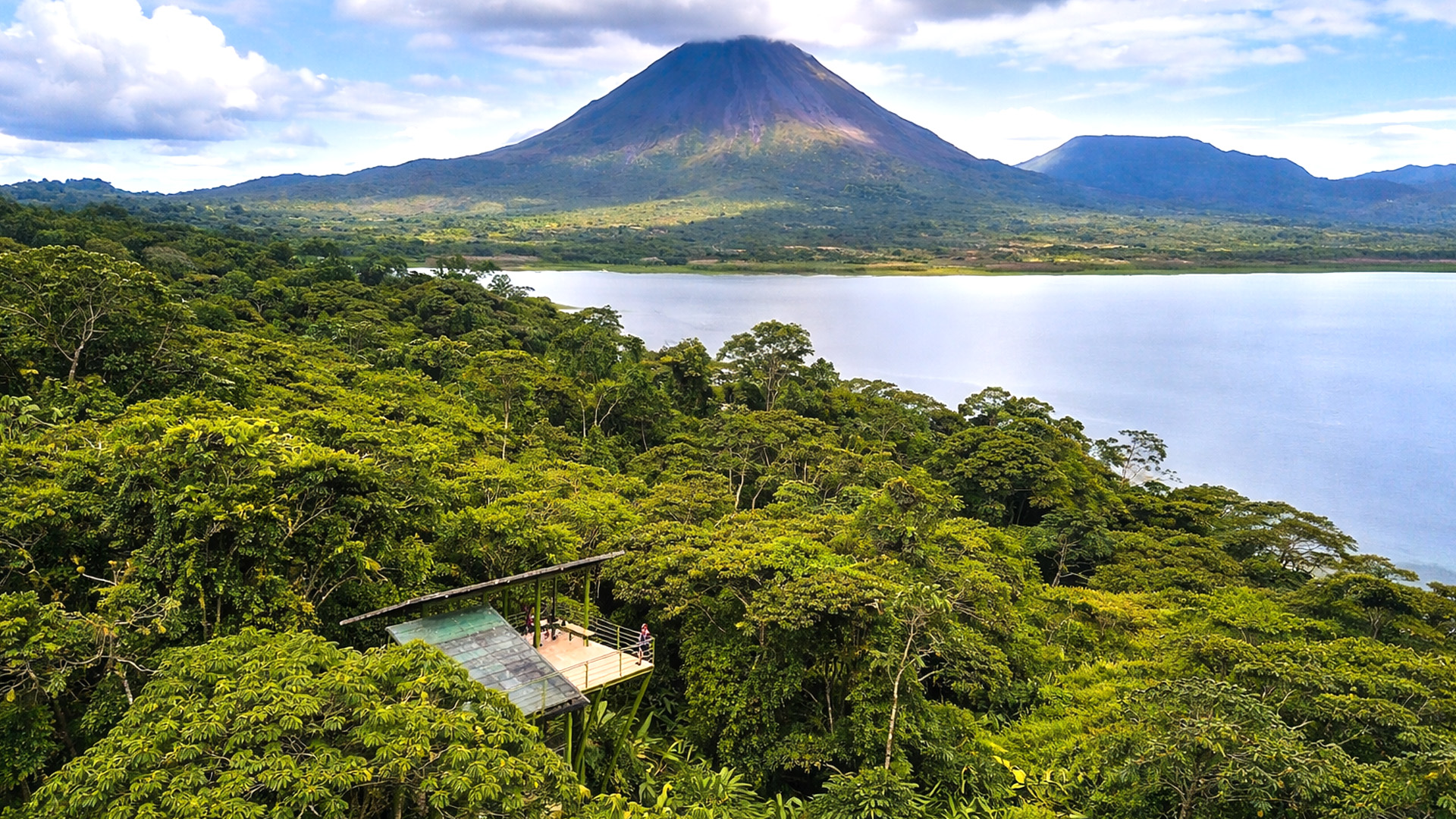 Where lush rainforest surrounds the sleeping Arenal volcano