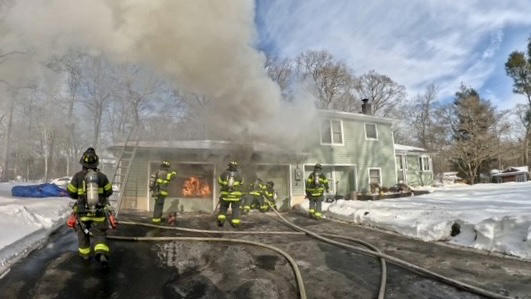 Video: 4 displaced after garage fire at Norwalk home