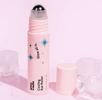 Cooling eye roller with metal ball tip and