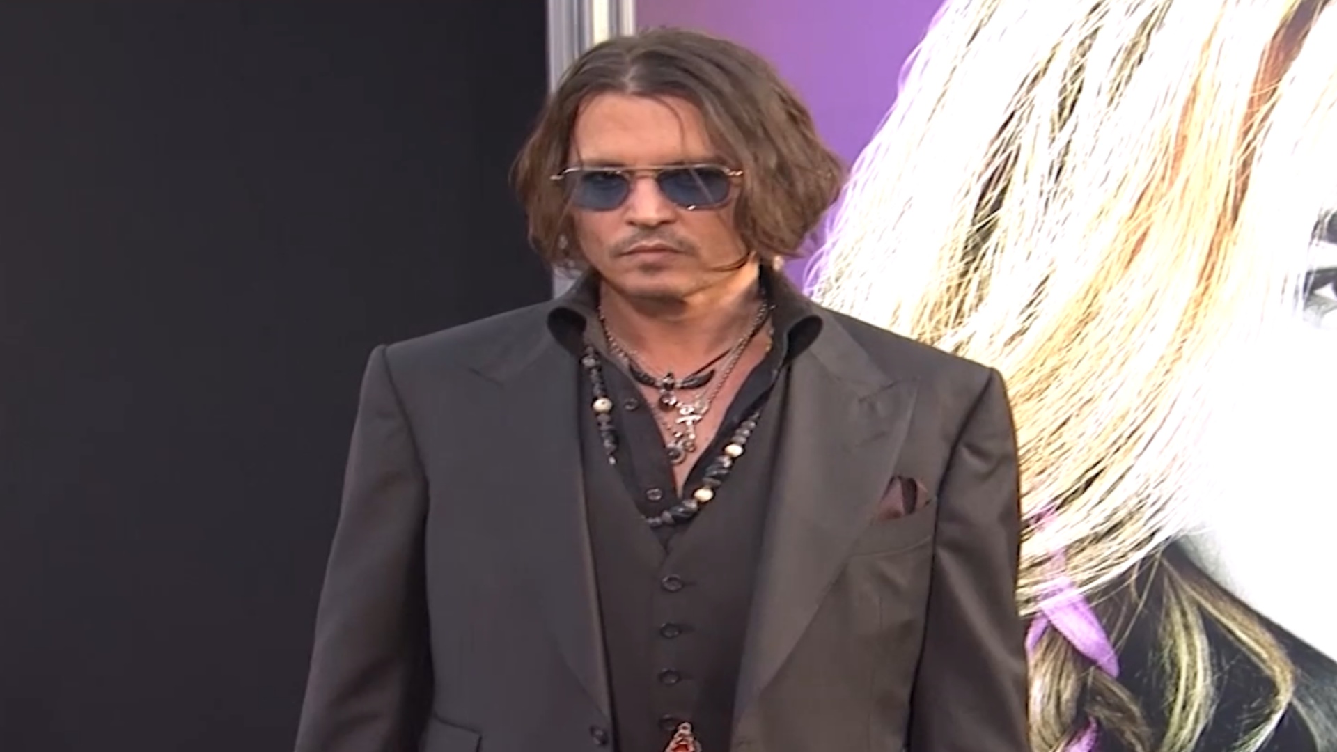 Johnny Depp makes a stylish red carpet appearance