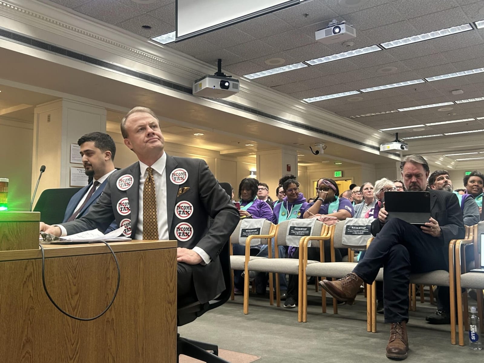 Public has its say at Senate hearing on controversial income tax legislation<br>