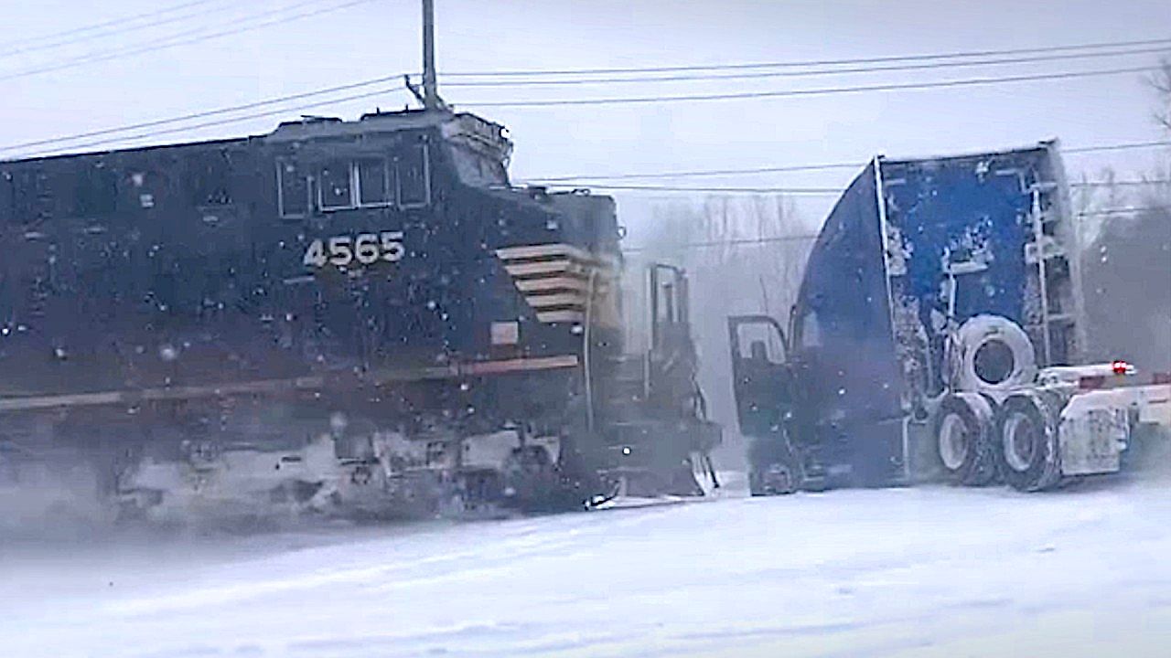 Dramatic moment between train and a stuck truck on tracks in North Carolina