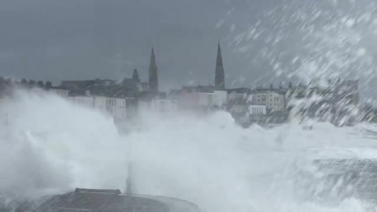 Waves crash into Scotsman’s Bay during stormy weather in Ireland