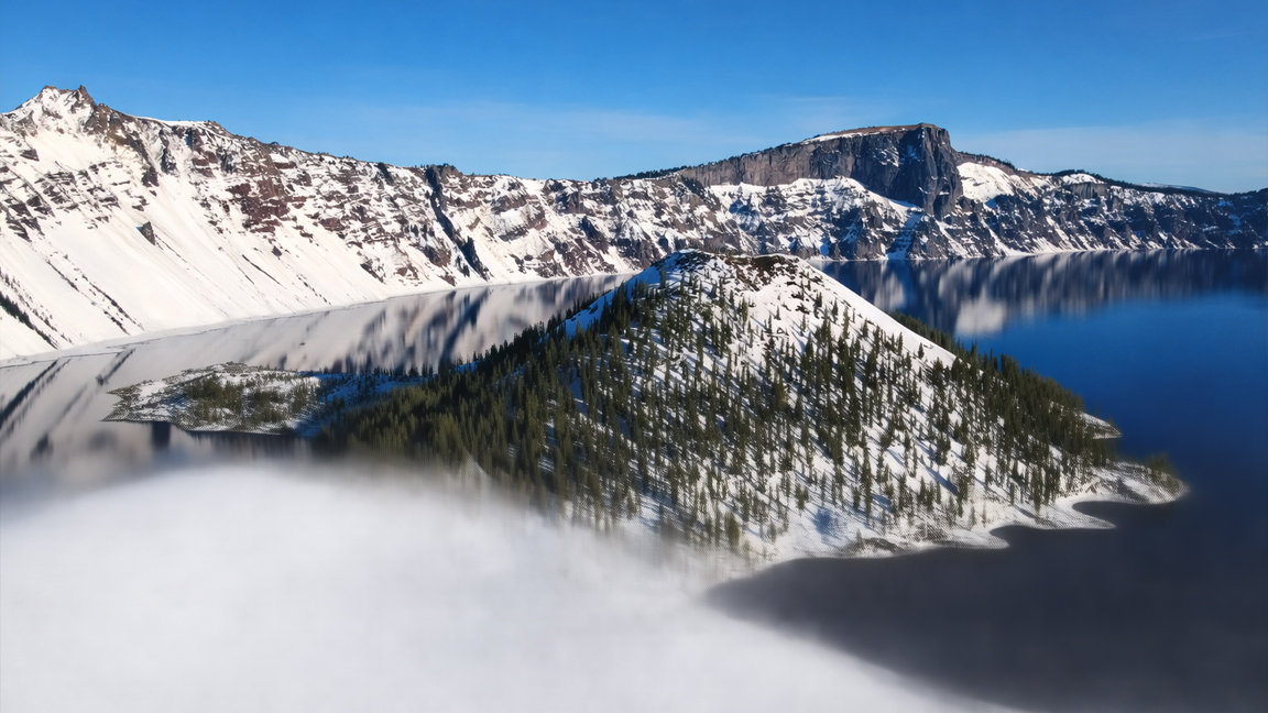Peaceful mountain lake surrounded by snow