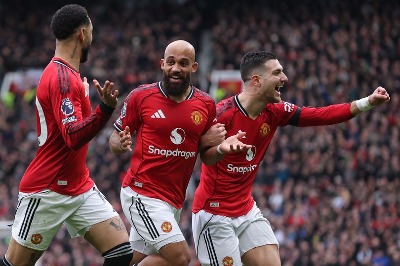MANCHESTER, ENGLAND - FEBRUARY 07: Bryan Mbeumo of Manchester United celebrates after scoring their side's first goal during the Premier League match between Manchester United and Tottenham Hotspur at Old Trafford on February 07, 2026 in Manchester, England. (Photo by James Gill - Danehouse/Getty Images)