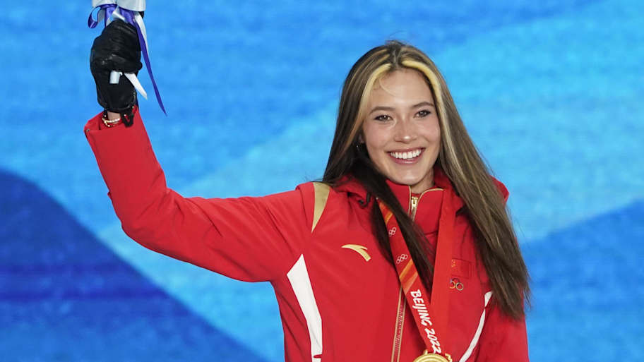Eileen Gu stuns in ab-revealing top while model chills in Olympic ...