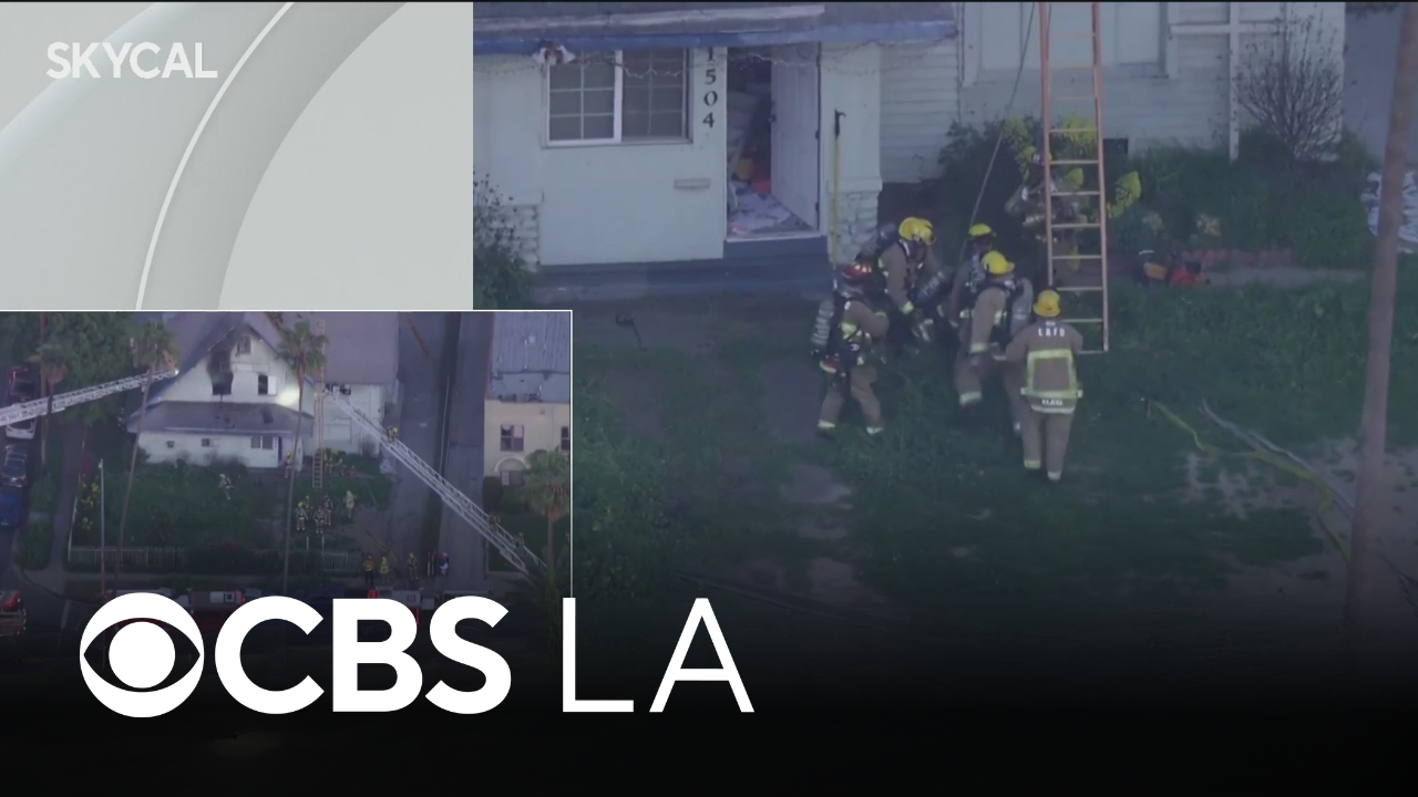 Los Angeles firefighter falls off ladder while battling house fire in ...
