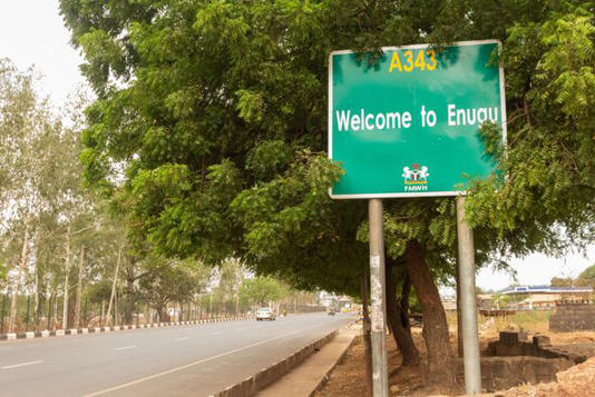 Welcome to Enugu: Roadside Sign in Nigeria, Africa