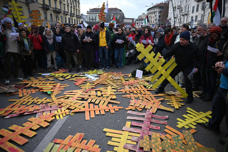 In photos: Protesters clash with police near Milan Winter Olympics site