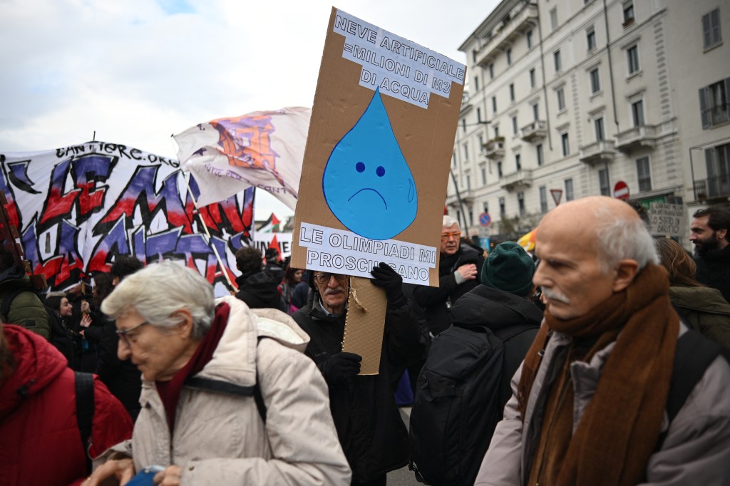 In photos: Protesters clash with police near Milan Winter Olympics site