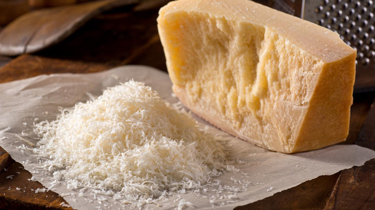 Exactly when to add Parmesan cheese to tomato sauce