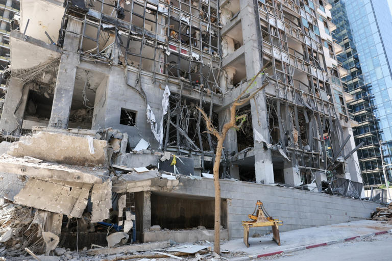 A residential building damaged by an Iranian missile strike in Israel last year.