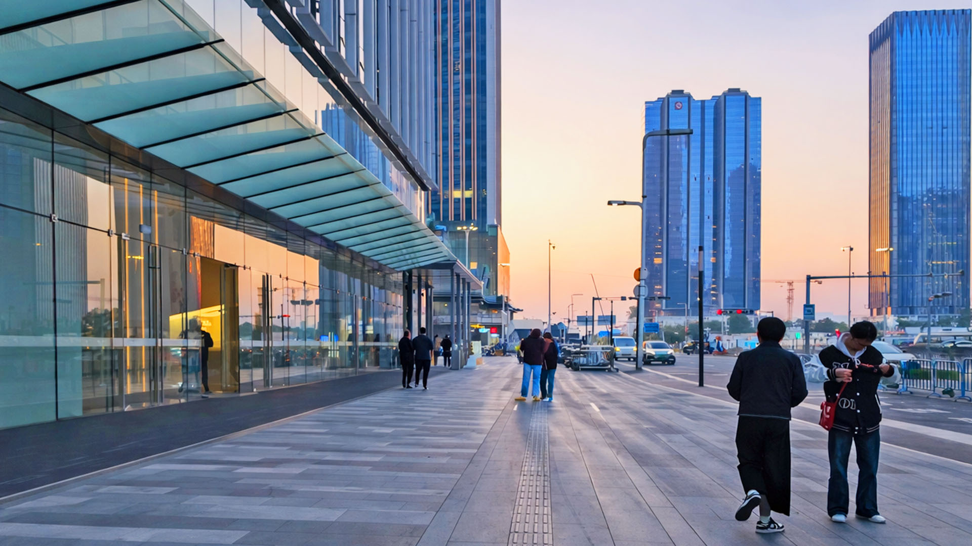 Sunset reflects on China’s glass towers