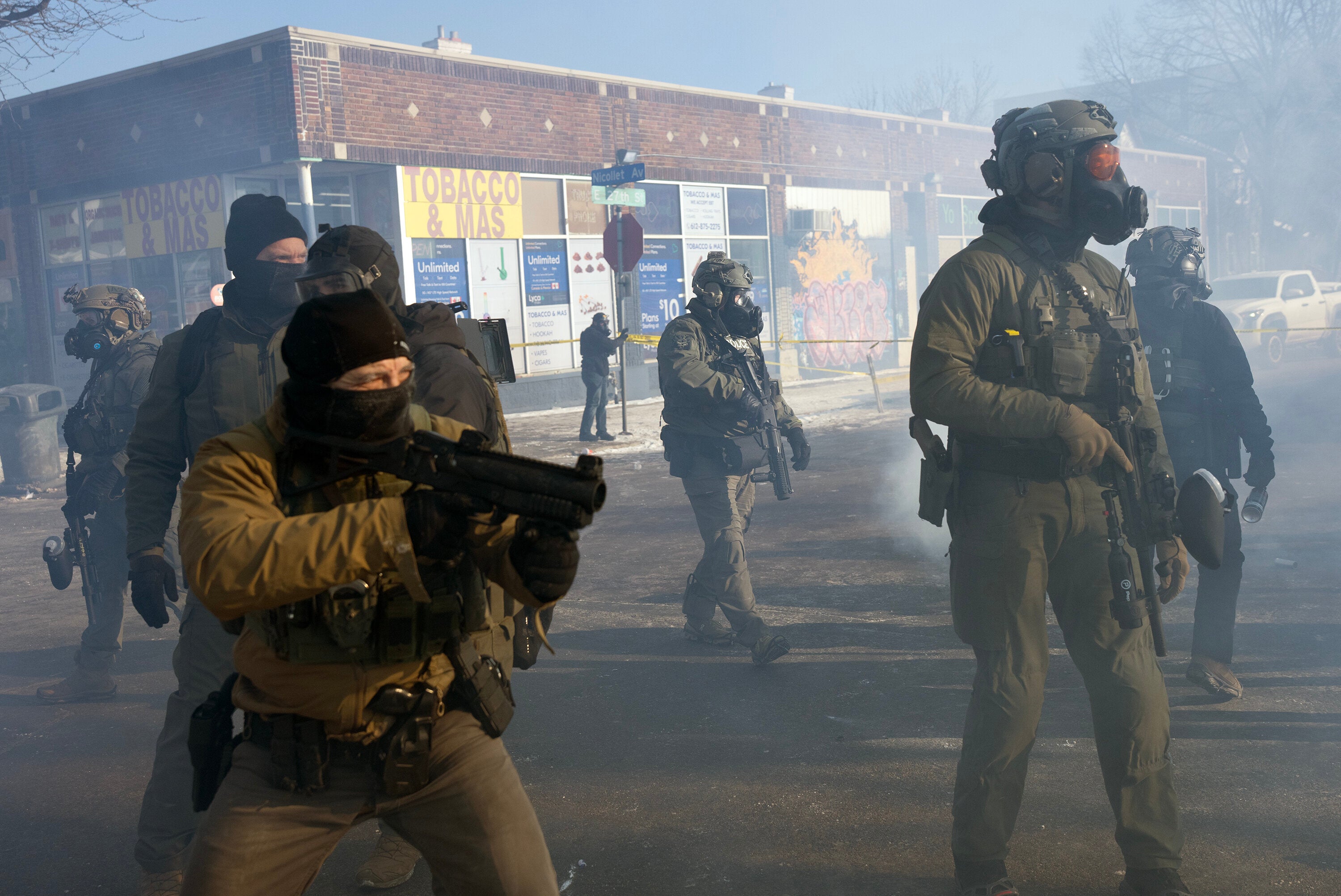 MINNEAPOLIS, MN. - JANUARY 2026: ICE (Immigration and Customs Enforcement) officers and federal agents clash with a growing crowd of protesters on Nicollet Avenue in south Minneapolis after Alex Pretti was fatally shot by federal agents in the area early Saturday morning, January 24, 2026. (Photo by Richard Tsong-Taatarii/The Minnesota Star Tribune) (Photo: Star Tribune via Getty Images via Getty Images)