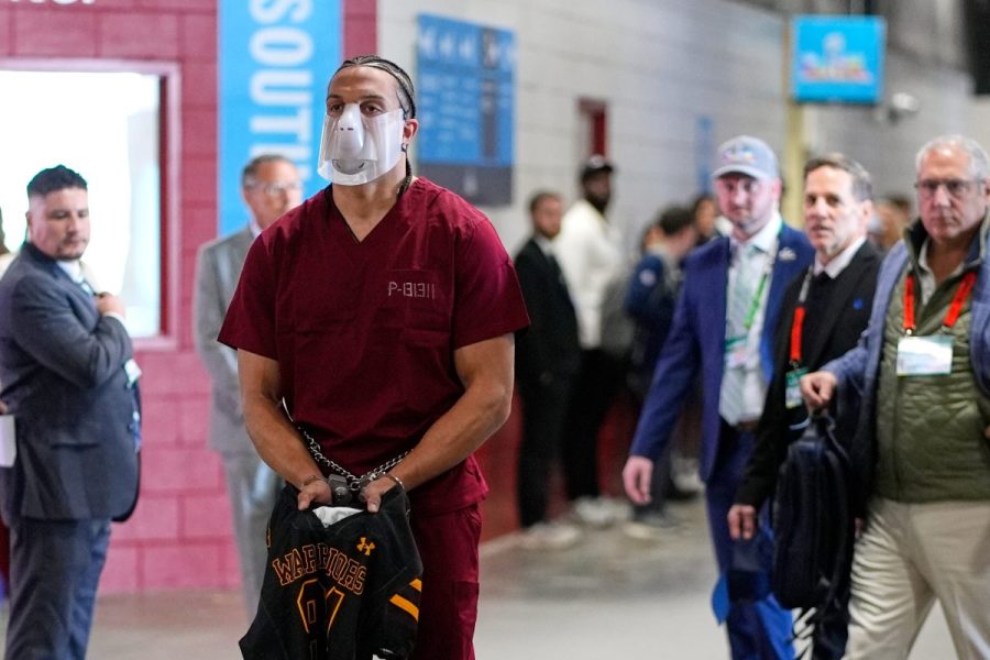 Photos: Patriots player shows up to Super Bowl in shackles, latest in line of eccentric outfits