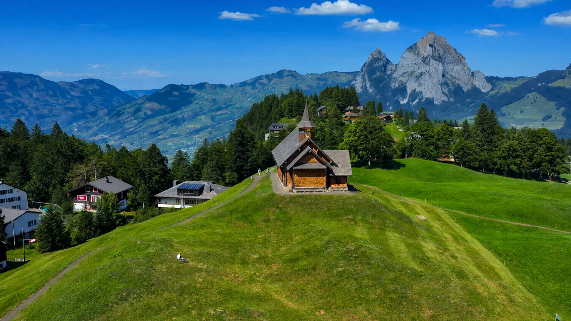 Peaceful church on green hillside