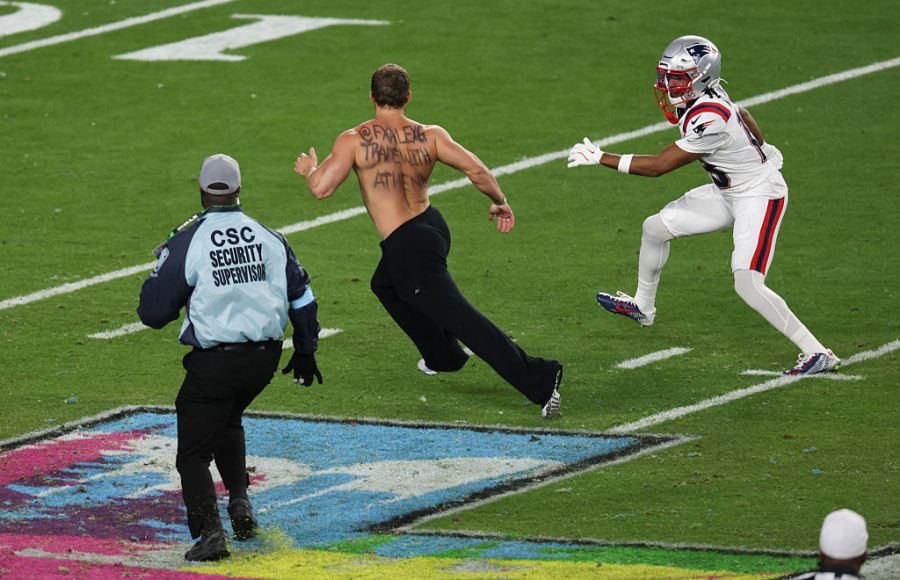 Shirtless man runs on field, interrupts Super Bowl LX