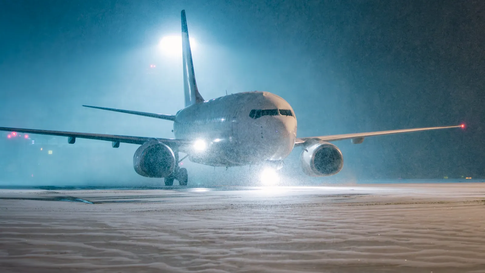 Flights canceled as a winter storm grips the US and what travelers ...