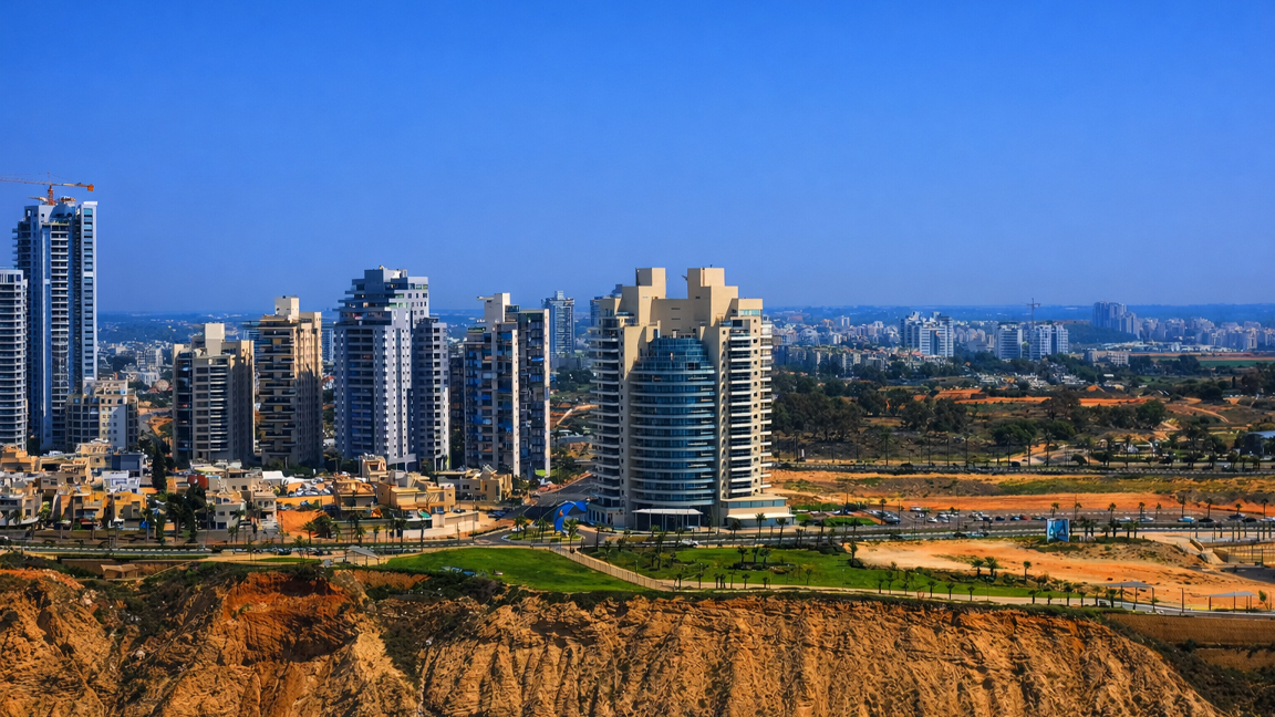 Modern city skyline under clear blue sky