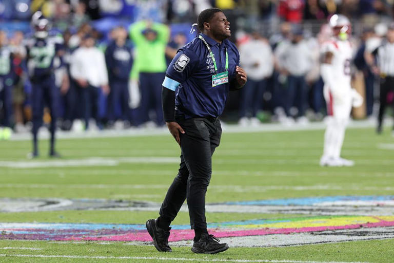 Shirtless man runs on field, interrupts Super Bowl LX