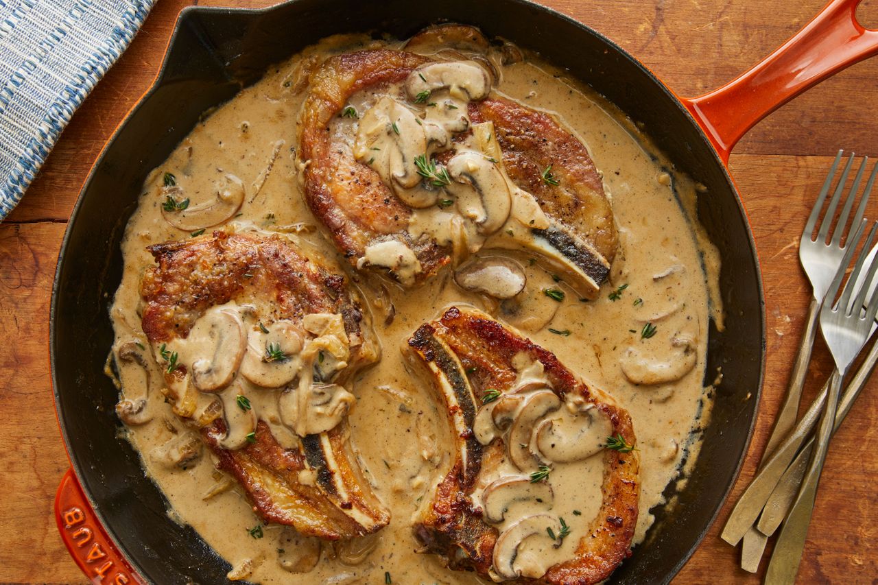 Smothered pork chops served in a pot