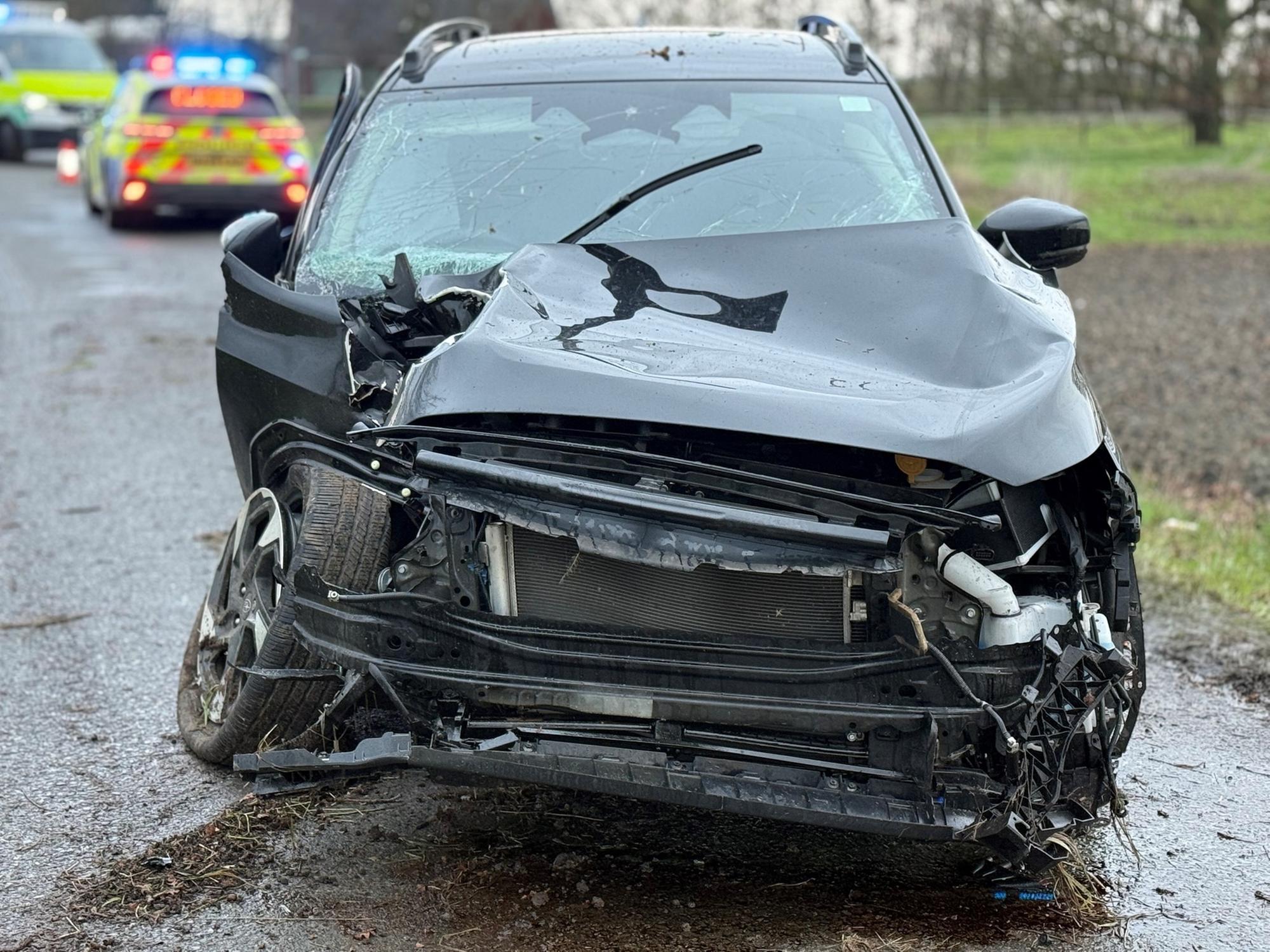 Man arrested on suspicion of drink driving after car crashes into tree ...