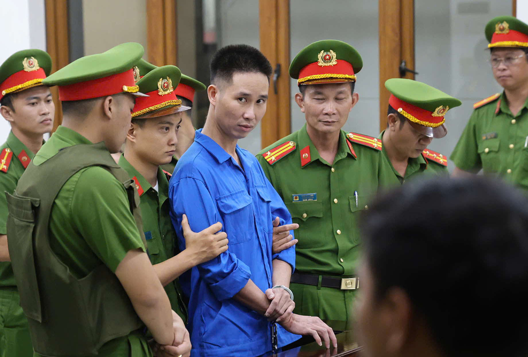 Lê Sỹ Tùng lúc tòa tuyên án, chiều 9/2. Ảnh: Phước Tuấn