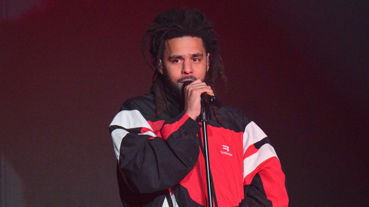 J Cole sells copies of 'The Fall-Off' to fans from trunk of his car