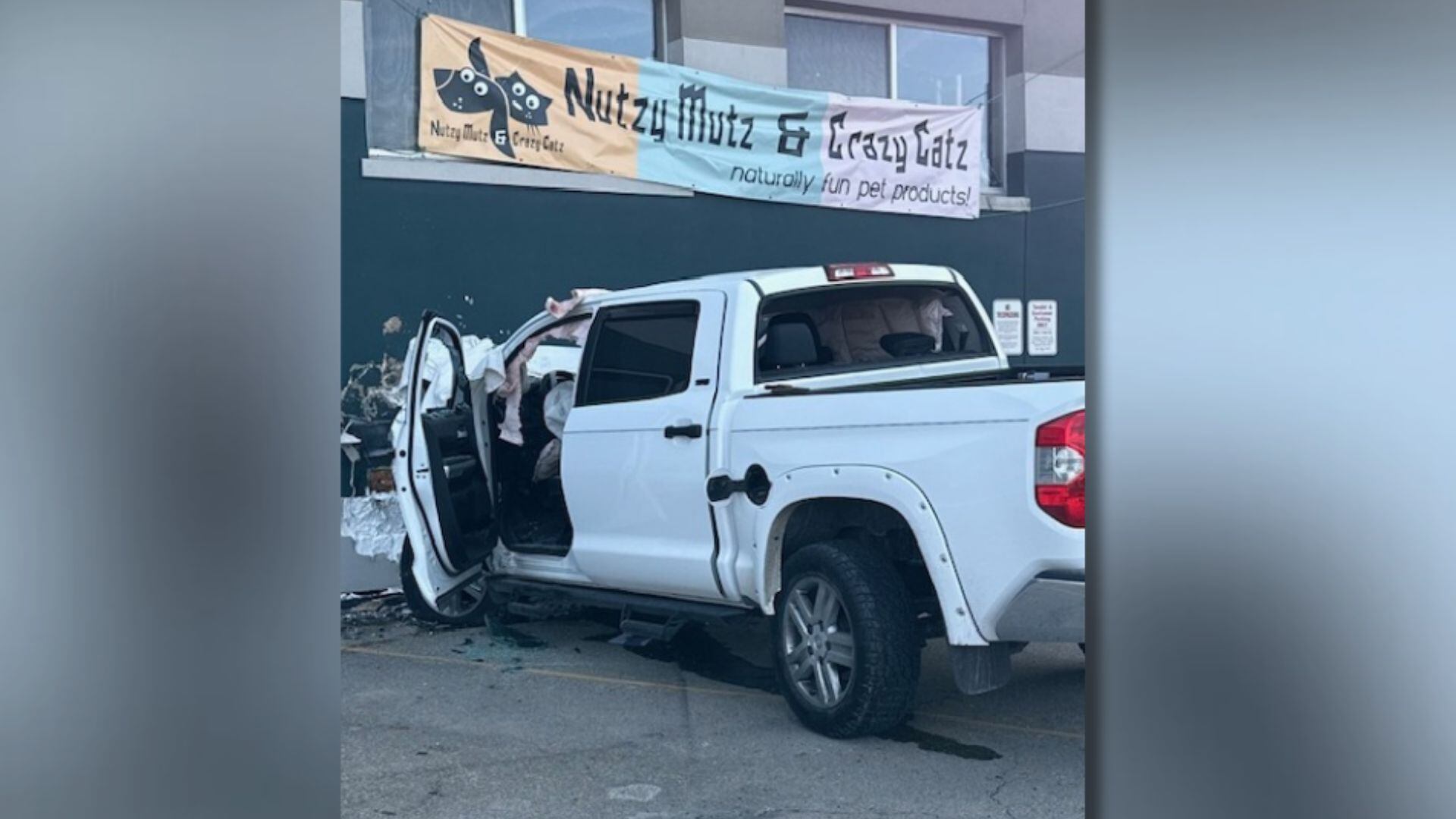 One hurt after truck crashes into Madison building