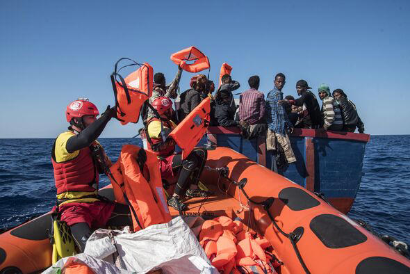 Two babies among 53 migrants dead or missing after boat capsizes at sea