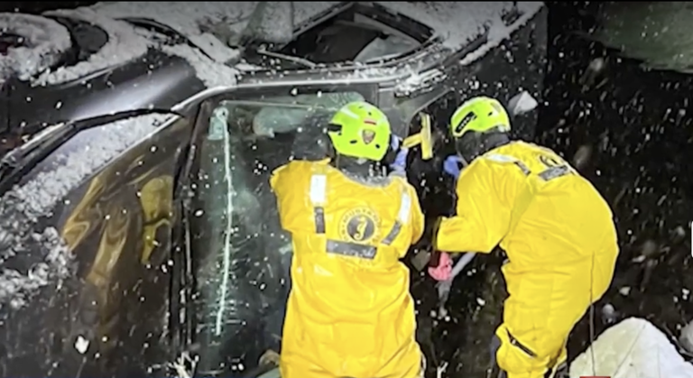 Nurse rescued after car slides off icy Mass. bridge into river