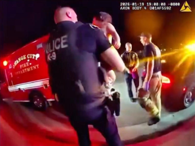 Heroic cop races to save choking baby in dramatic body cam video