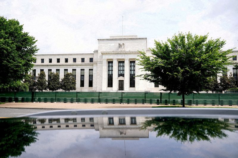 Fed holds rates steady, sees 