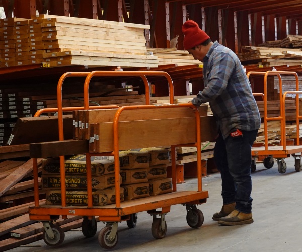 Home Depot to cut 800 jobs, mandate five-day office return