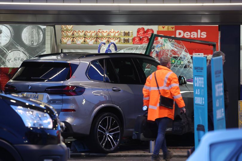 Man killed after car smashes through Spar shop as 'community in ...