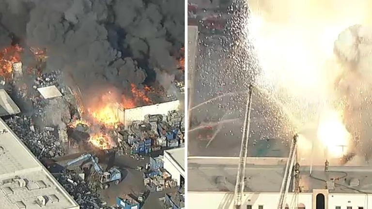 Large fire at metal recycling center sends massive plume of smoke into ...