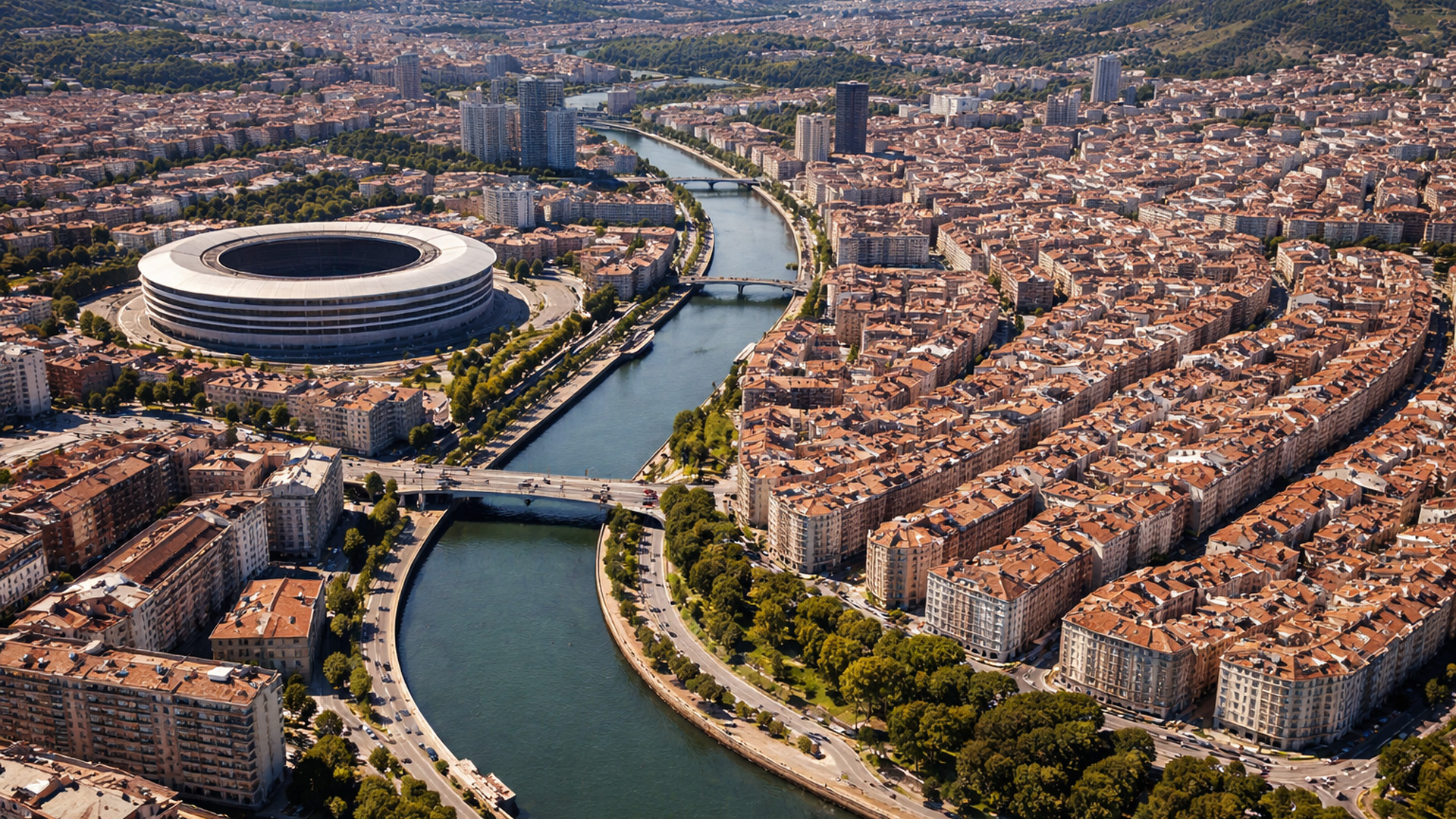 From above, a river city and stadium landmark