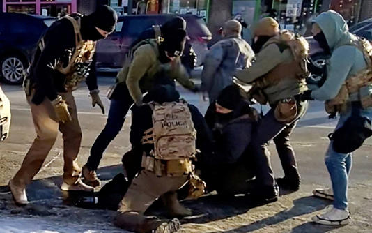 The moment the first shot is fired at Alex Pretti (via REUTERS)