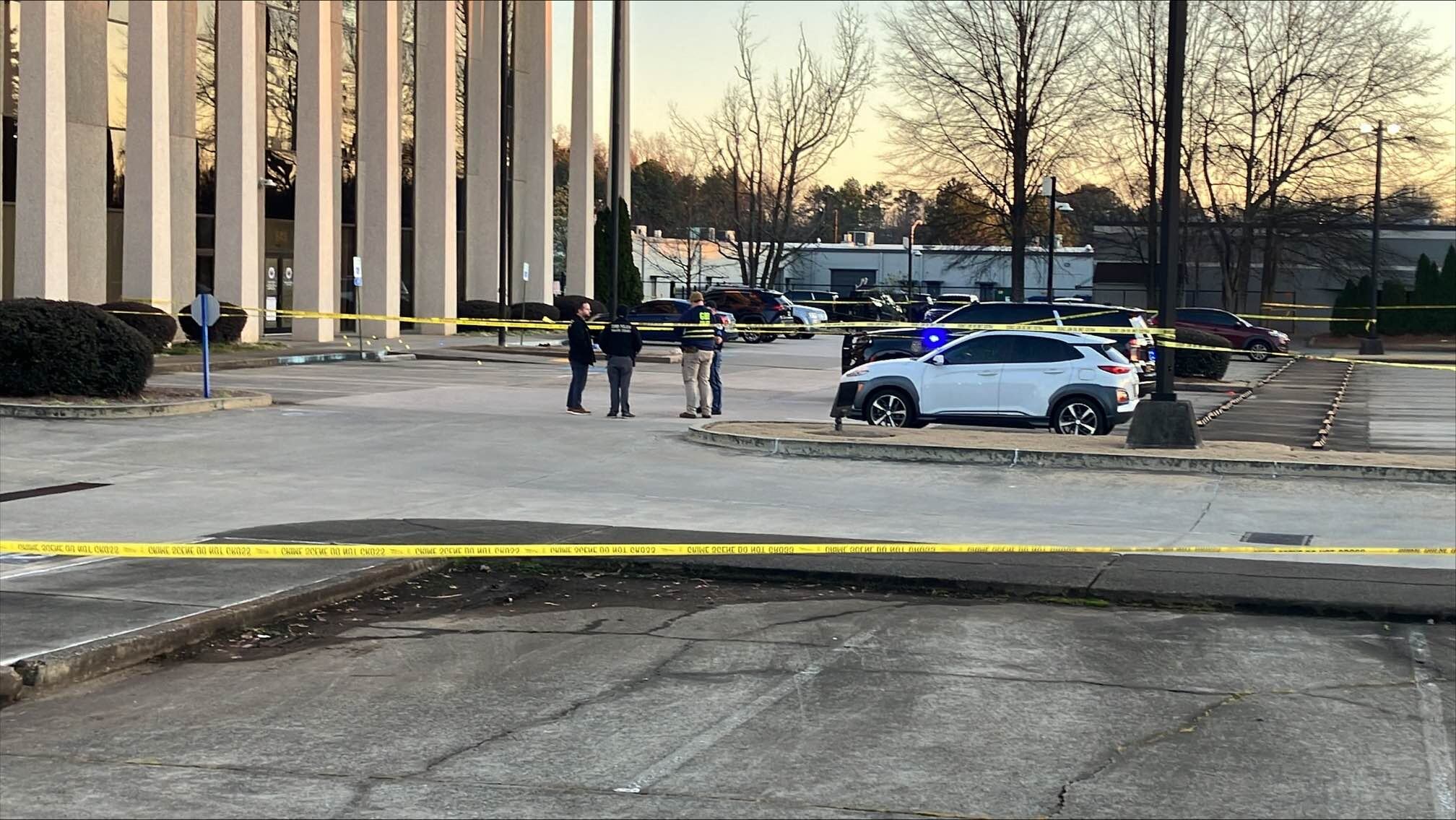 Woman injured in shooting involving officer outside Cobb County police ...
