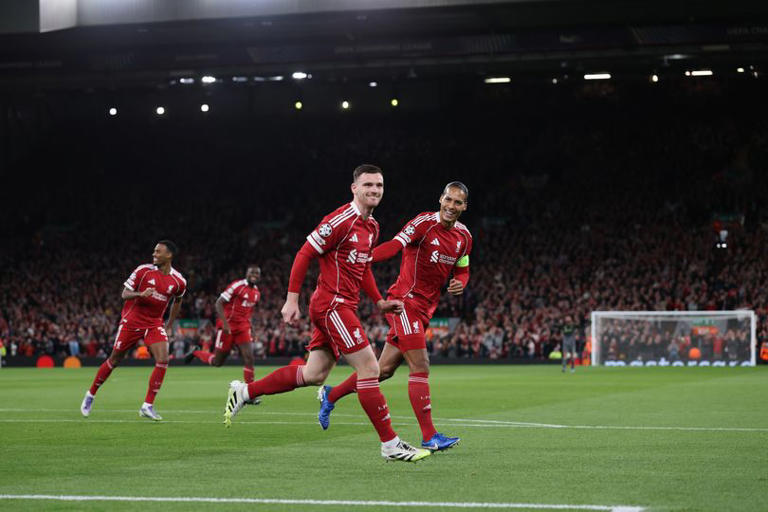 Andrew Robertson of Liverpool celebrates his goal to make it 1-0 with Virgil van Dijk of Liverpool during the UEFA Champions League 2025/26 League Phase MD1 match between Liverpool FC and Atletico de Madrid at Anfield on September 17, 2025 in Liverpool, England.