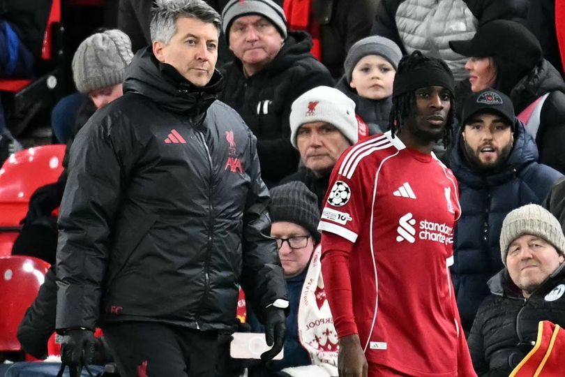 Liverpool's Dutch defender #30 Jeremie Frimpong leaves the pitch with an injury during the UEFA Champions League football match between Liverpool and Qarabag at Anfield in Liverpool, north west England on January 28, 2026. (Photo by Paul ELLIS / AFP via Getty Images)