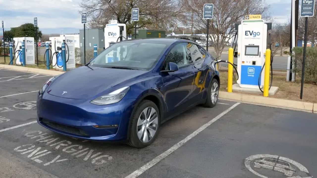 Tesla Model Y charging at an EVgo charger