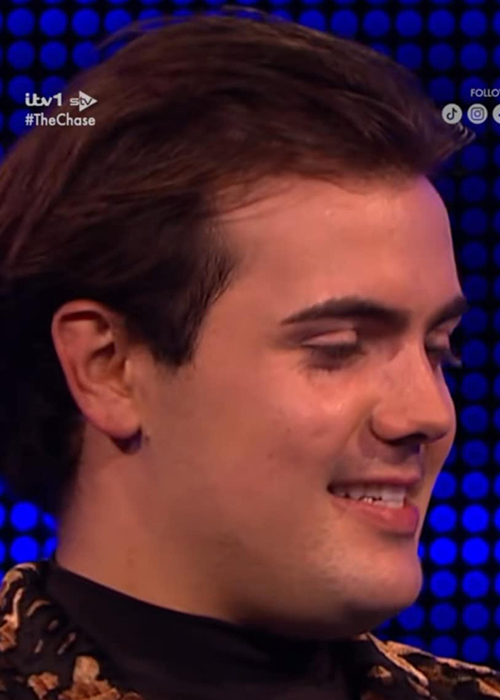 The moment sees contestant Matthew coming up to face Shaun Wallace, also known as The Dark Destroyer. Pic: TikTok/ The Chase