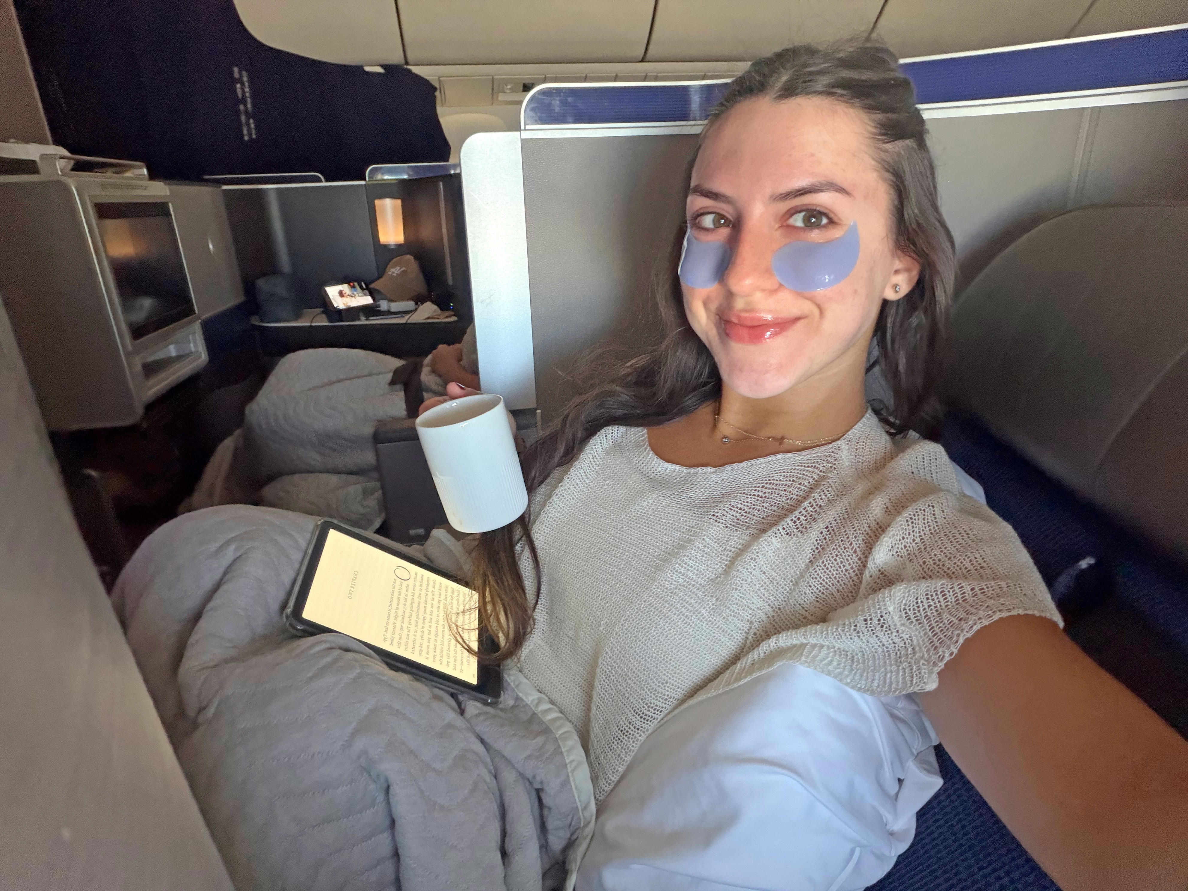 I flew 8 hours in United Polaris business class. The lie-flat seat was ...