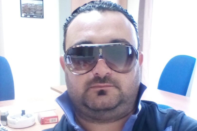 Alfonso Turano wears sunglasses in a selfie