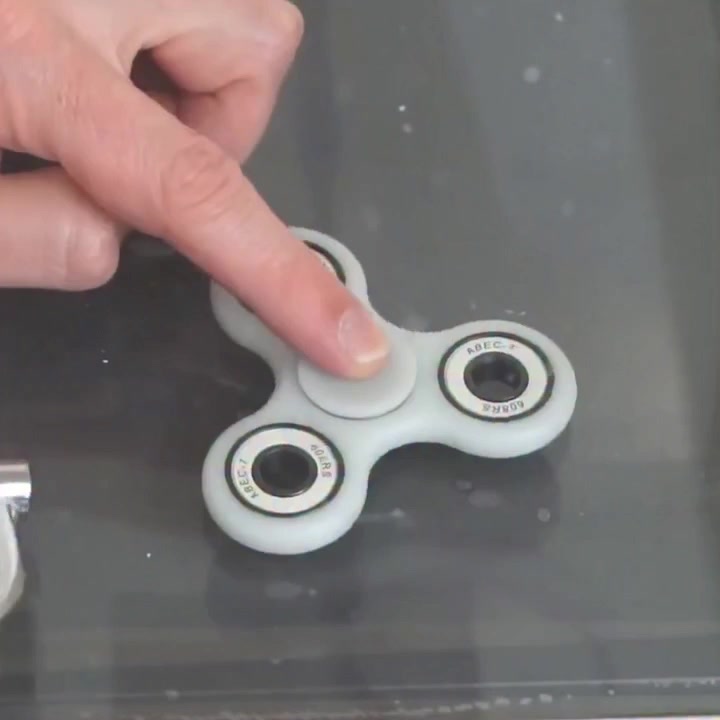 Can a fidget spinner spin forever without air drag?
