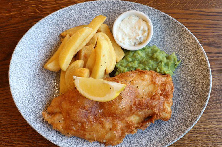 Greater Manchester pub known for canalside views, roaring fires and ...