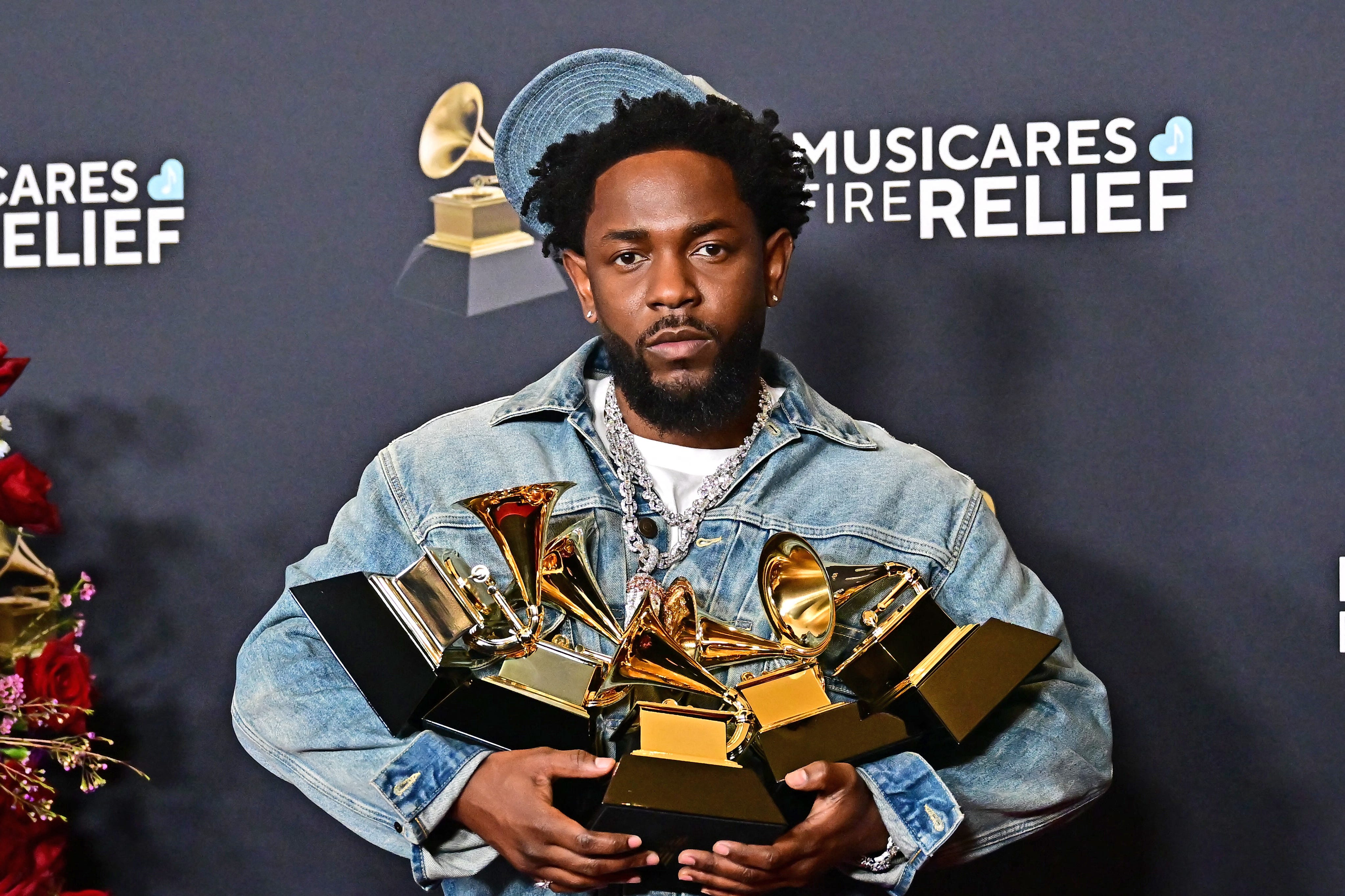 Kendrick Lamar poses with the record of the year, best rap performance, song of the year, best music video, best rap song awards in the press room during the 67th annual Grammy Awards at the Crypto.com Arena in Los Angeles on Feb. 2, 2025.