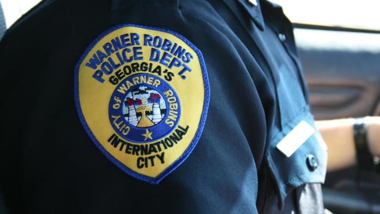 Georgia officer, woman in critical condition after being shot